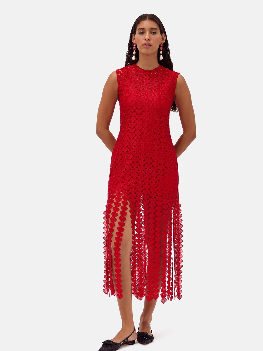 Romance Was Born — Red lace shift dress trimmed with heart chains and a fringed hem.