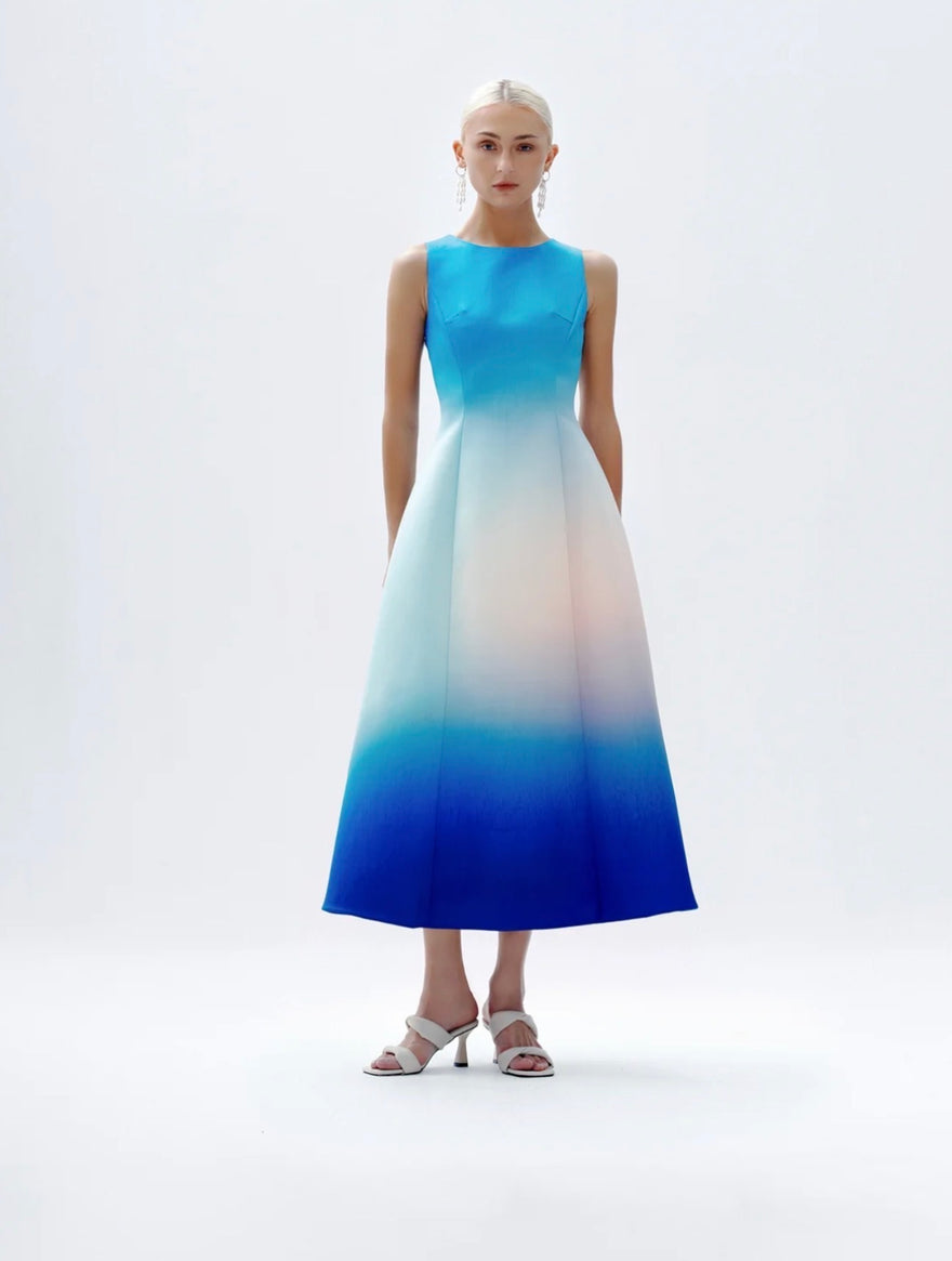 JUSTIN TONG — Blue gradient fit-and-flare midi dress with a softly structured skirt.